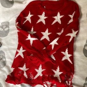 Distressed star sweater